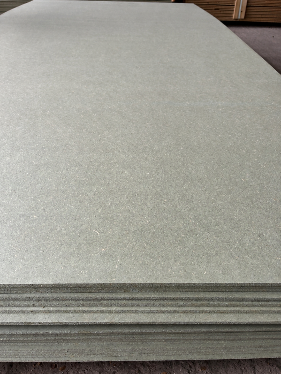 Moisture resistant MDF sheets, 2440 x 1220mm, stacked at Tendring Lumber Company